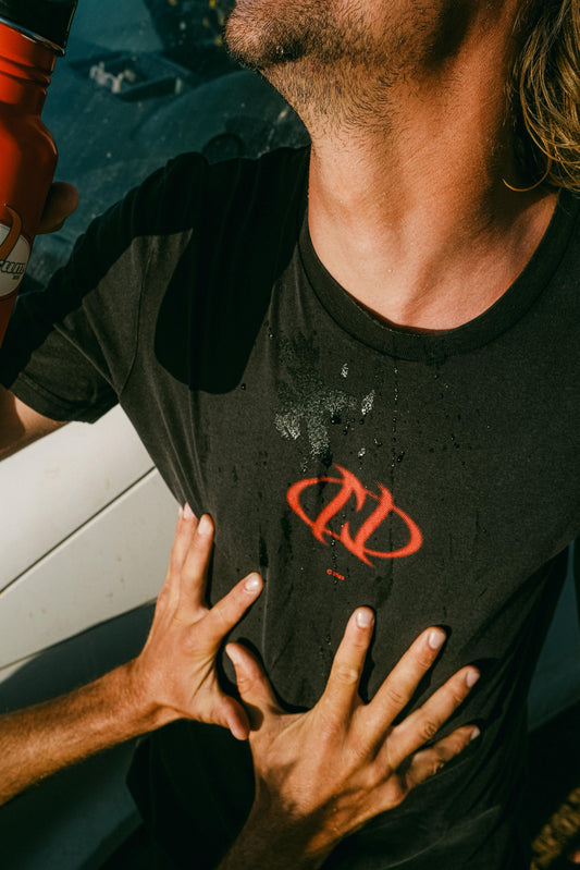 T-shirt - "Travel Light, Play Loud"