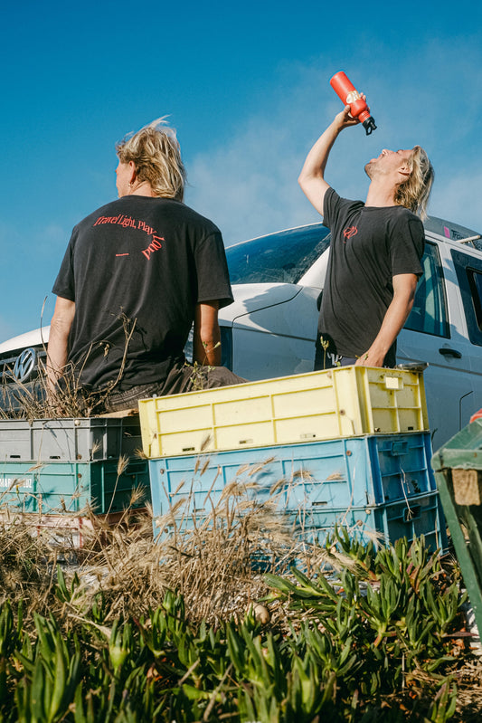 T-shirt - "Travel Light, Play Loud"