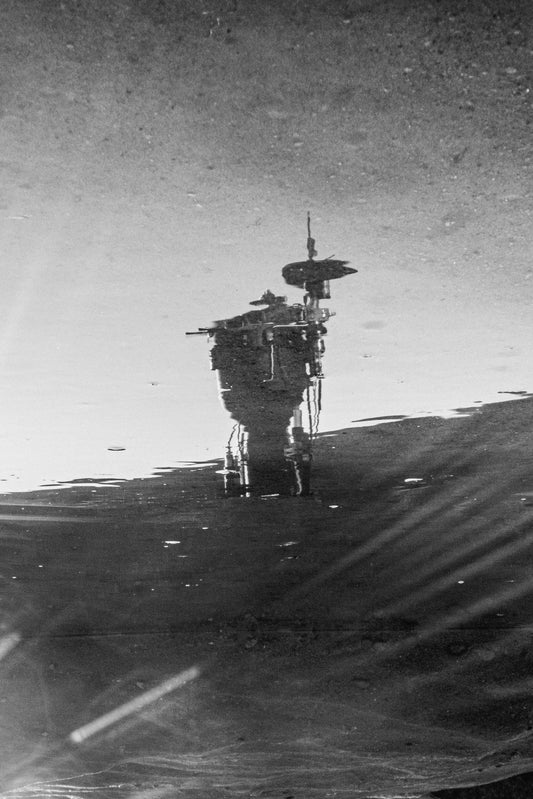 Drumkit in the reflection of water